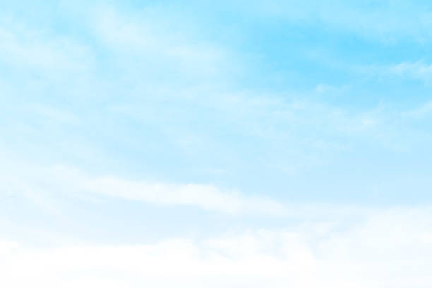 istock Blue pastel sky with white fluffy cloud. Cumulus clouds background. 2215658726