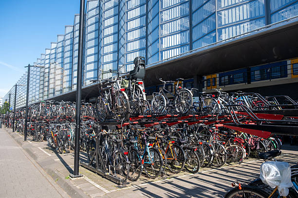 Amsterdam, Netherlands - April 8, 2017: Bicycle street parking. Amsterdam is the bicycle capital of Europe and one of the most original and unique cities of Europe