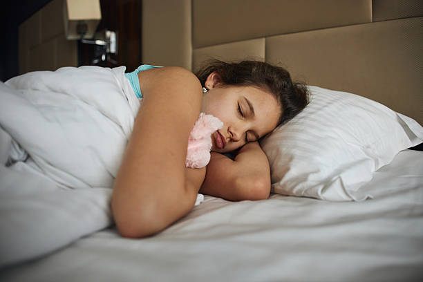 istock Beautiful girl sleeping 2215662964