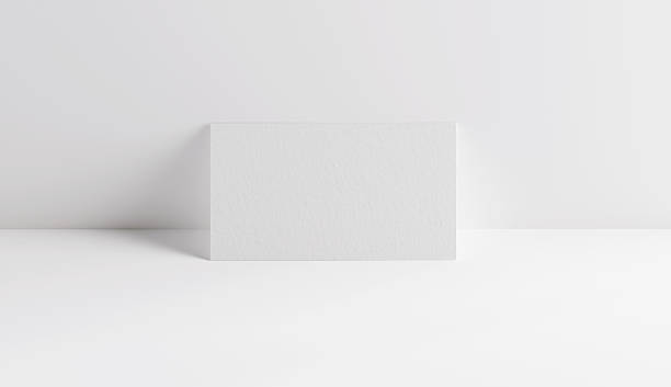 istock Blank business cards on white background with soft shadows 2215666530
