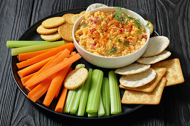 istock pimento cheese dip served with crackers, veggies 2215667915