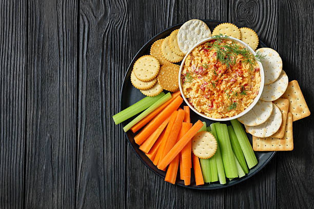 istock pimento cheese dip served with crackers, veggies 2215668056