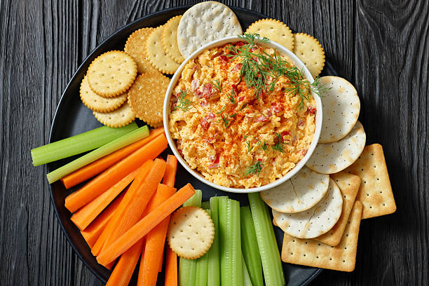 istock pimento cheese dip served with crackers, veggies 2215668057