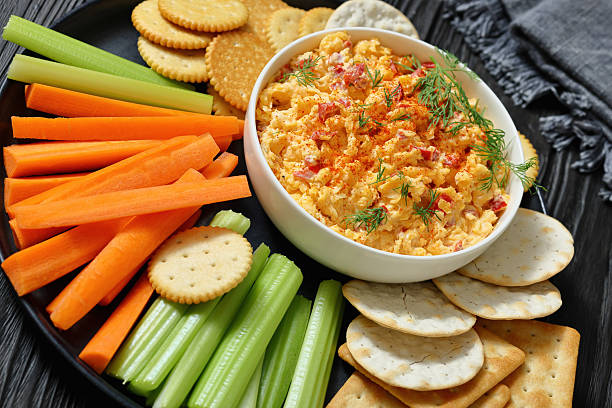istock pimento cheese dip served with crackers, veggies 2215668122