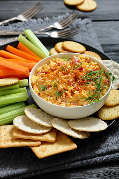 istock pimento cheese dip served with crackers, veggies 2215668257