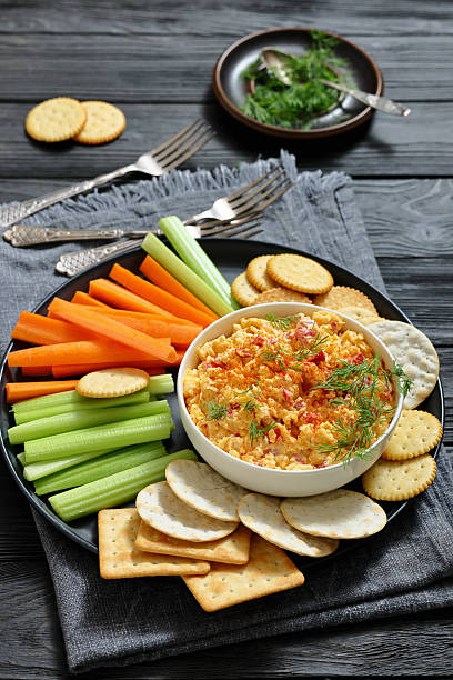 istock pimento cheese dip served with crackers, veggies 2215668395