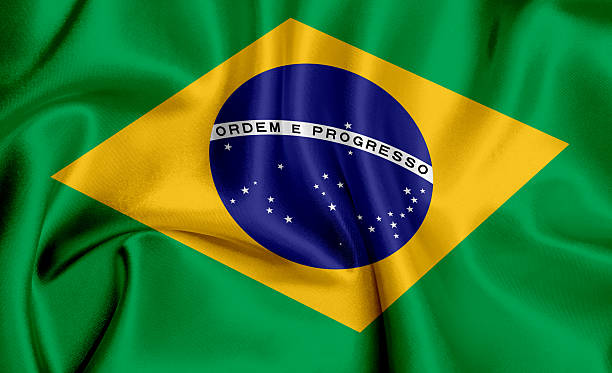 istock Vector flag of Brazil waving background 2215679559