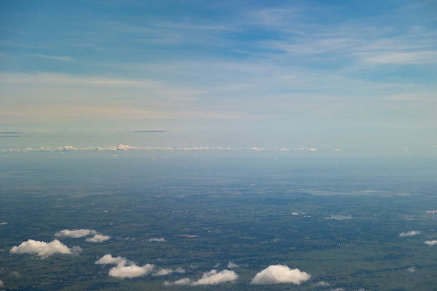 Sky and cloud seen from window of airplane