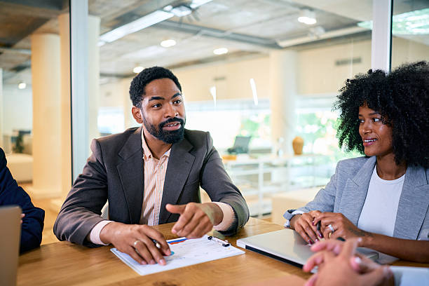 istock Business team discussing during a meeting in a modern office 2215688107
