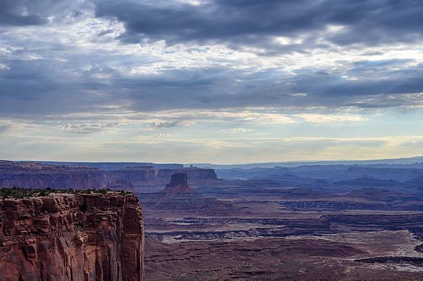 istock Vast Canyonlands landscape under a dramatic cloudy sky. 2215692365