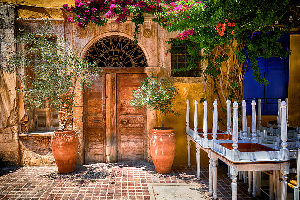 istock Traditional mediterranean backyard with old doors 2215696947