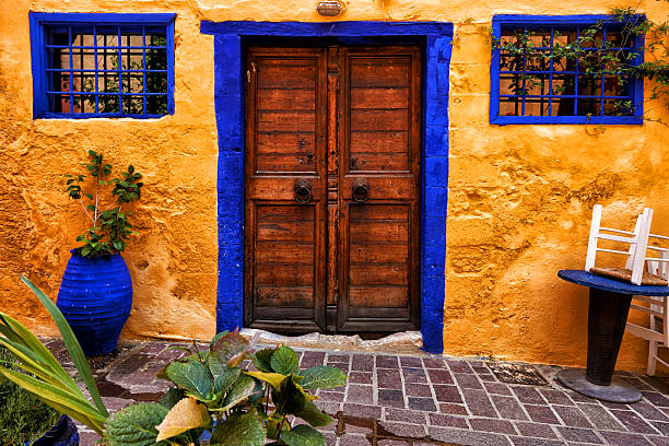istock Traditional mediterranean backyard with old doors 2215697107