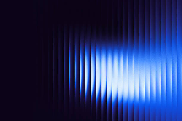 istock White-light blue-blue gradient with a glass effect on a black background — a futuristic look featuring cool glow, soft waves, and transparent layers that create a sense of motion. 2215701906
