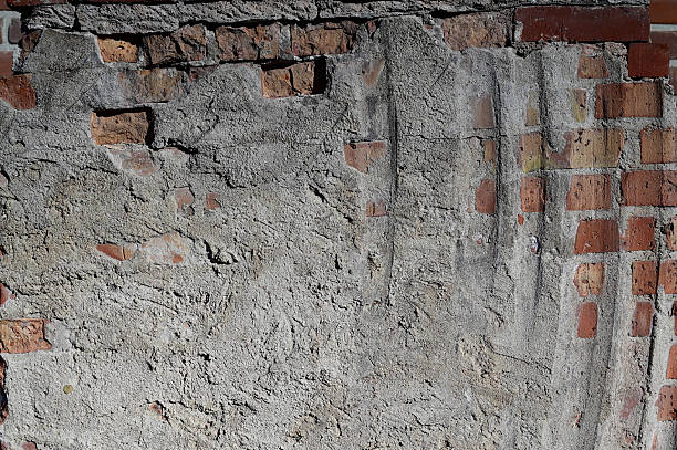 istock Gray concrete on the brick wall 2215705267