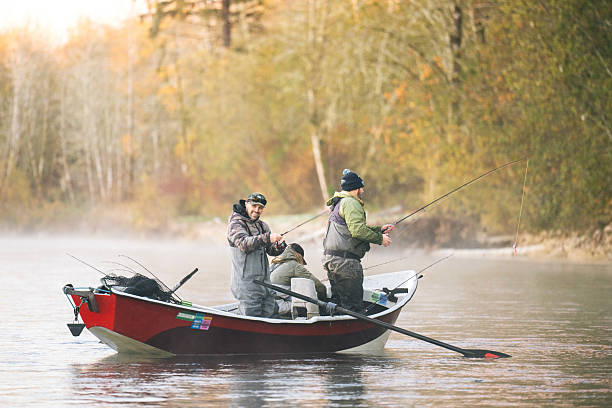 istock Young couple on guided drift fishing trip on river 2215706284