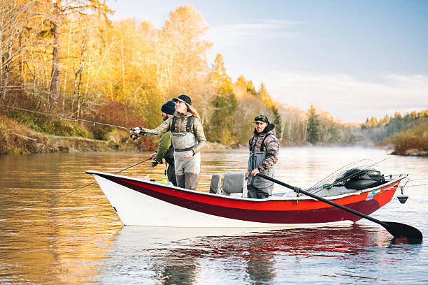istock Young couple on guided drift fishing trip on river 2215706426