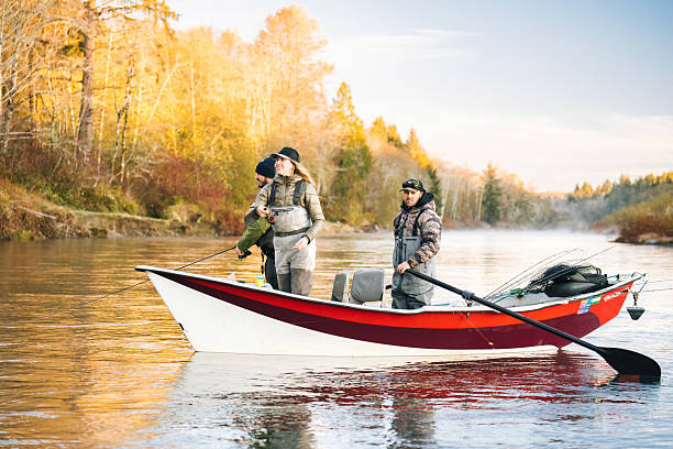 istock Young couple on guided drift fishing trip on river 2215706427