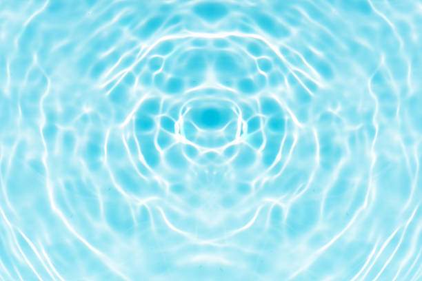 Abstract transparent water shadow surface texture natural ripple on blue background
