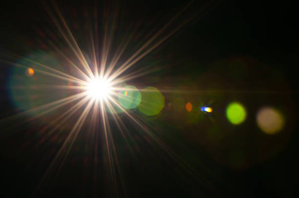 istock Sun flare on the black background 2215710515