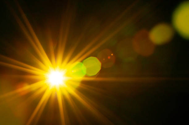 istock Sun flare on the black background 2215711612