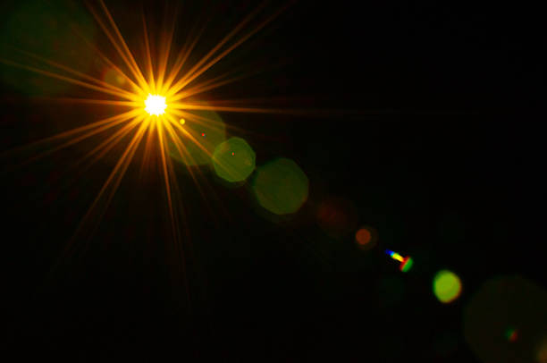 istock Sun flare on the black background 2215711735