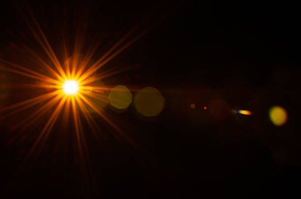 istock Sun flare on the black background 2215712483