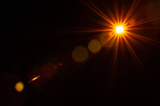 istock Sun flare on the black background 2215712613