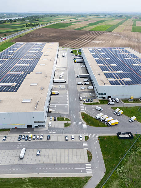 istock Logistics centers with solar panels on roofs. Aerial view. 2215717537