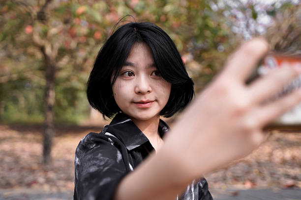 istock The girl taking a selfie 2215719268