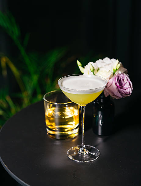 istock Stylish yellow cocktail with floral decor. 2215720388
