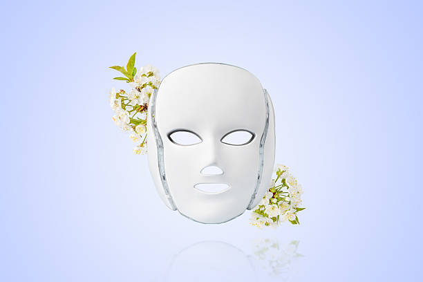 istock LED facial mask and flowers 2215722080