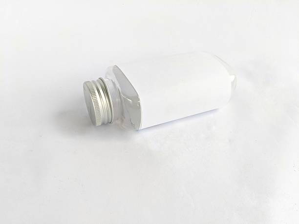 istock Clear glass bottle on white background 2215722348
