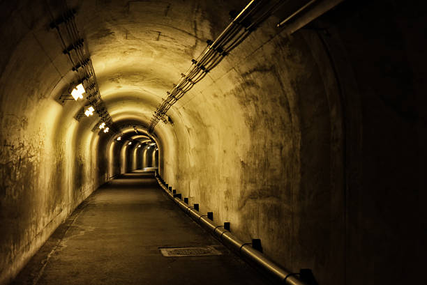 istock Underground Tunnel Background with yellow light  for Sci-Fi or Thriller Design Projects 2215723453
