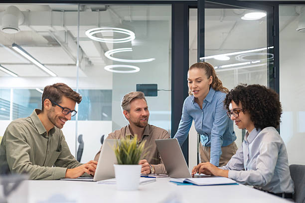 istock Business team discussing together business plans in office. 2215723878