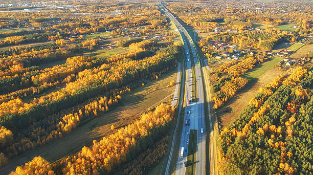 istock Drone view of highway in autumn scenery 2215725188