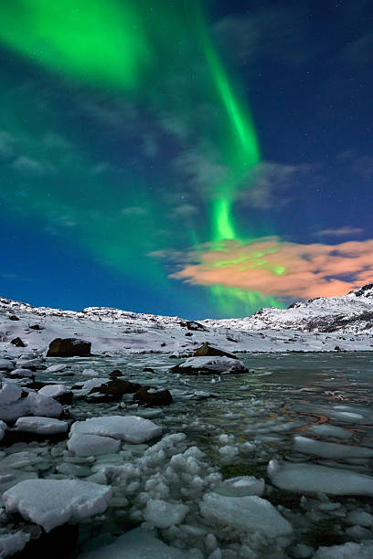 istock Aurora borealis over Norway lofotens 2215725541