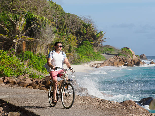 istock Handsome man with vintage bicycle. Clear, sunny day 2215725979