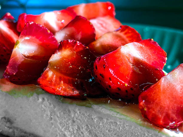 Piece of cheesecake with strawberries