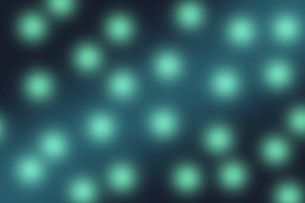Abstract glowing circles over a dark background creating an ethereal impression