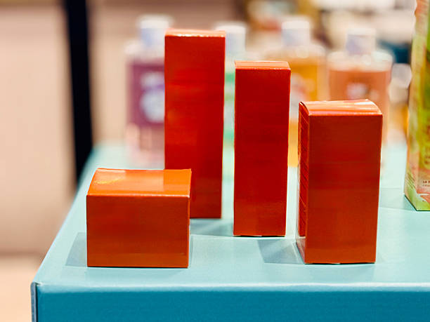 A carefully arranged stack of varied products creates an appealing visual display in a store setting.