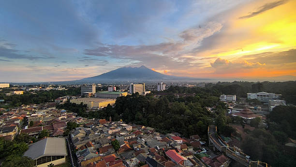 istock City skyline at sunset with a mountain in the background 2215749343