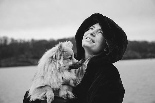 A young woman with her dog
