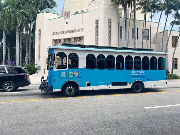 Miami, USA - February 16, 2025: Free Miami orange and green trolley