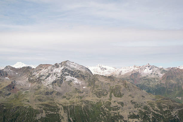Mountain peaks of Austrian Alps dusted with snow