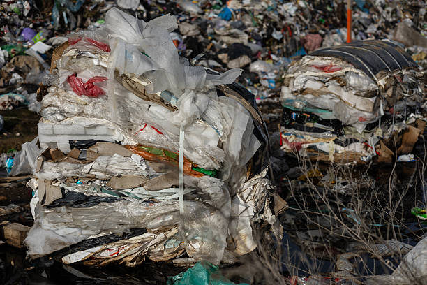 istock Mountains of trash and plastic debris create a serious pollution issue at a landfill site, highlighting waste management challenges 2215770159