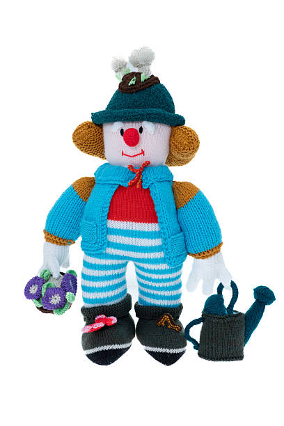 istock Hand knitted gardener - white background 2215774467