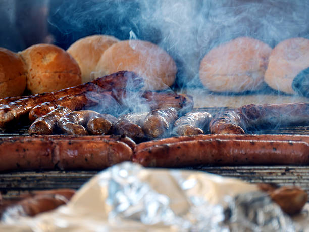 istock Traditional German Bratwurst Grilling with Fresh Buns 2215780562
