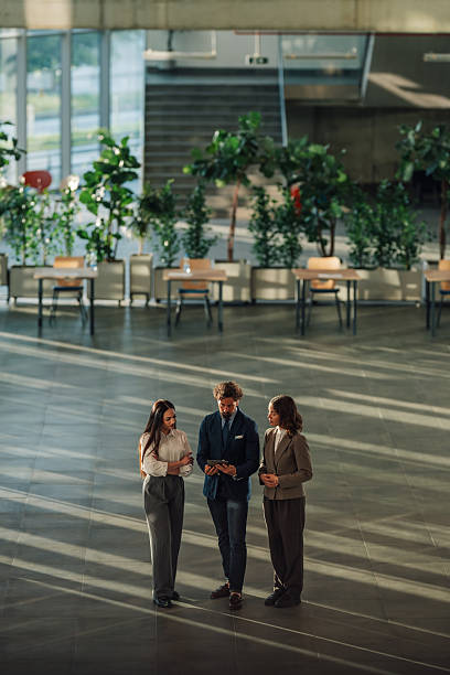 istock Business team discussing strategy on digital tablet in modern office 2215787899