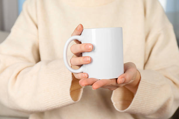 istock Woman with white ceramic cup, closeup. Mockup for design 2215790597