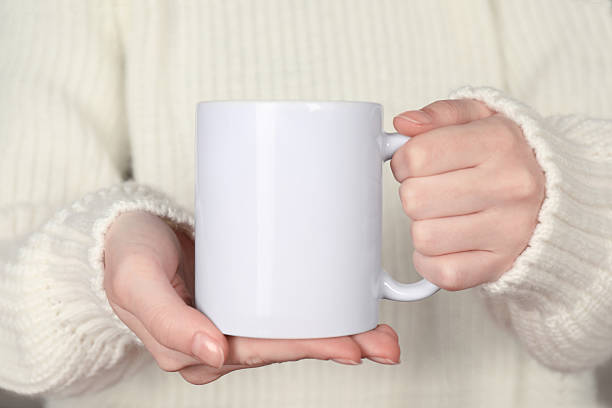 istock Woman with white ceramic cup, closeup. Mockup for design 2215790606